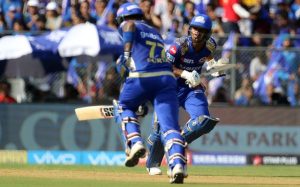 Evin Lewis of the Mumbai Indians and Surya Kumar Yadav of the Mumbai Indians takes a run