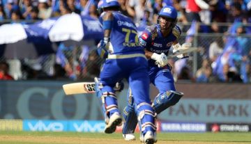 Evin Lewis of the Mumbai Indians and Surya Kumar Yadav of the Mumbai Indians takes a run