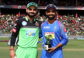 Virat Kohli captain of the Royal Challengers Bangalore and Ajinkya Rahane captain of the Rajasthan Royals during the toss of the match eleven of the Vivo Indian Premier League 2018 (IPL 2018) between the Royal Challengers Bangalore and the Rajasthan Royals held at the M. Chinnaswamy Stadium in Bangalore on the 15th April 2018.